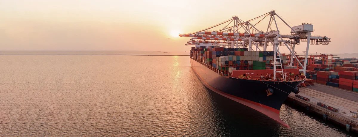 Crane loading freighter